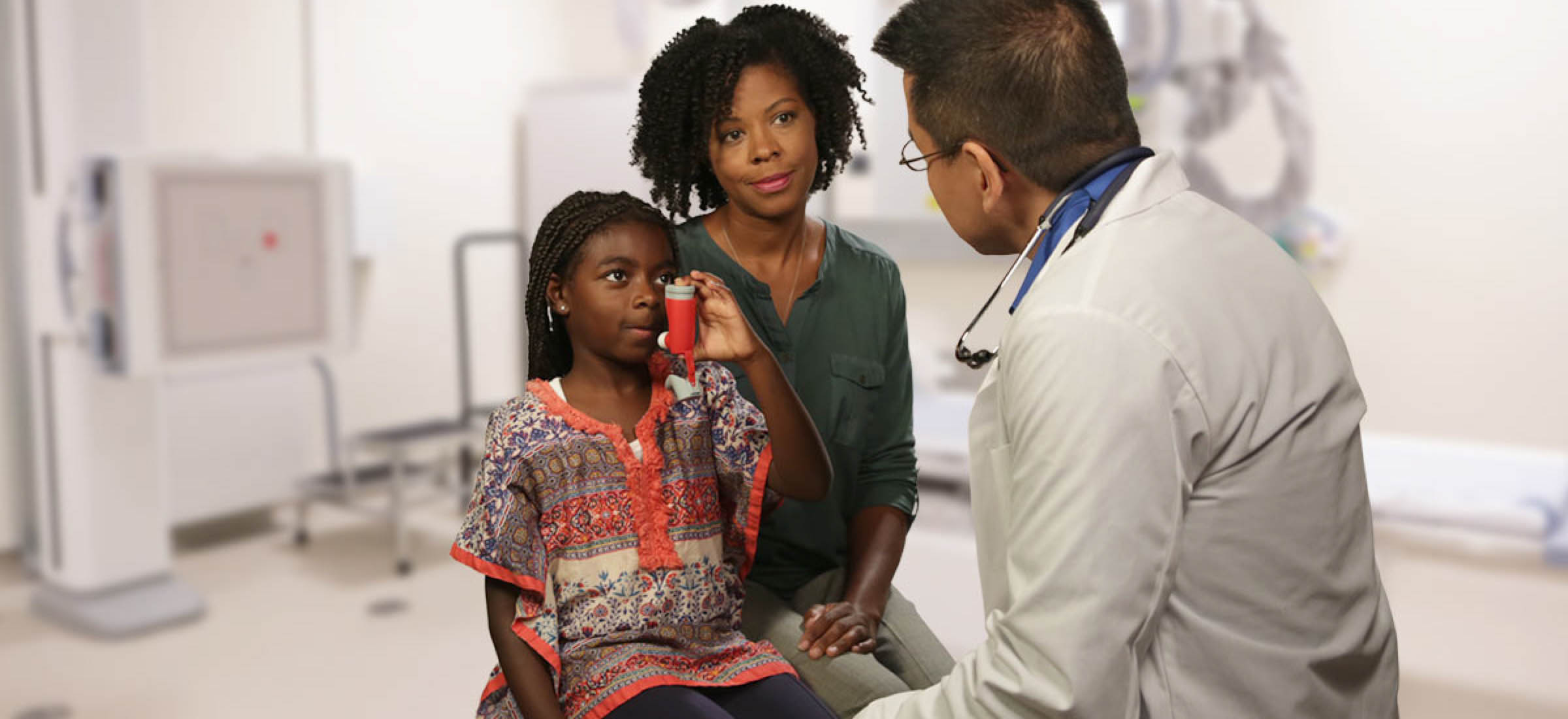 African American asthma patient with a doctor